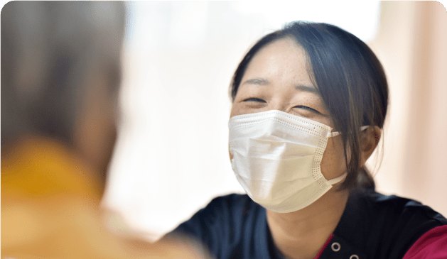 スタッフの笑顔の写真