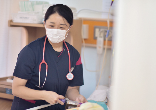 スタッフの笑顔の写真